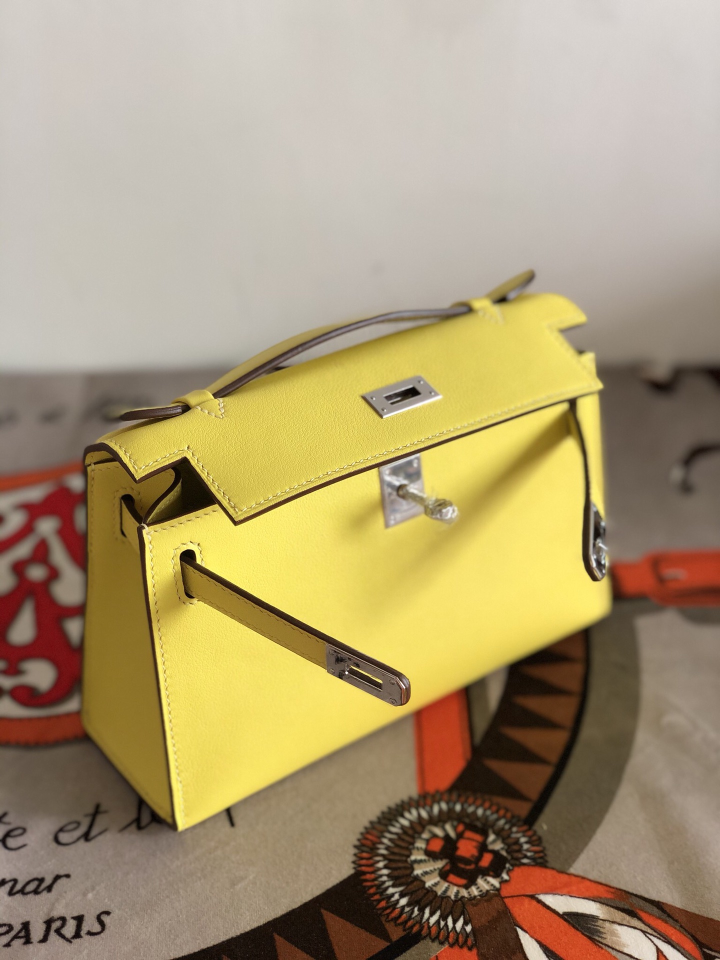 에르메스 미니 켈리백22 레몬 은장 스위프트